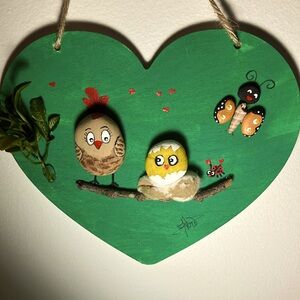 Piece of art made it whith stones and shells